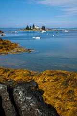 Pumpkin Island Lighthouse Along Rocky Maine Shore